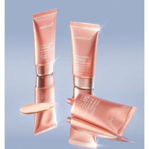 Applying MEDICUBE Collagen Firming Sun Cream for hydration and firming.

