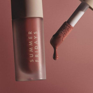 Summer Fridays Dream Lip Oil on a clean vanity with a soft, glossy finish on lips.

